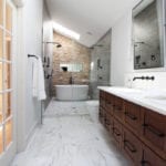 Luxury bathroom remodel atlanta walnut vanity marble floor open long bathroom freestanding tub stacked stone bathroom black faucets bathroom remodel ideas